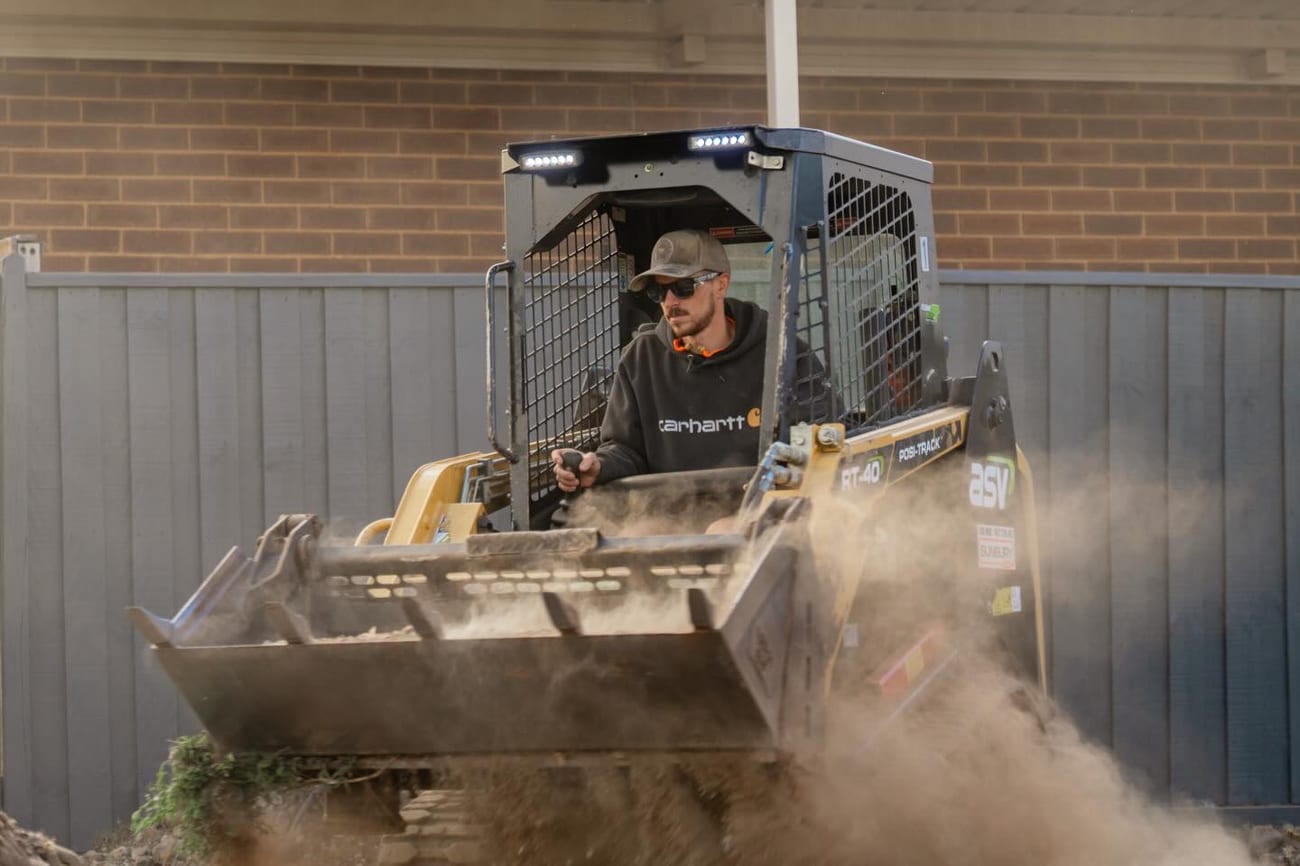 Site cut underway with a skid steer