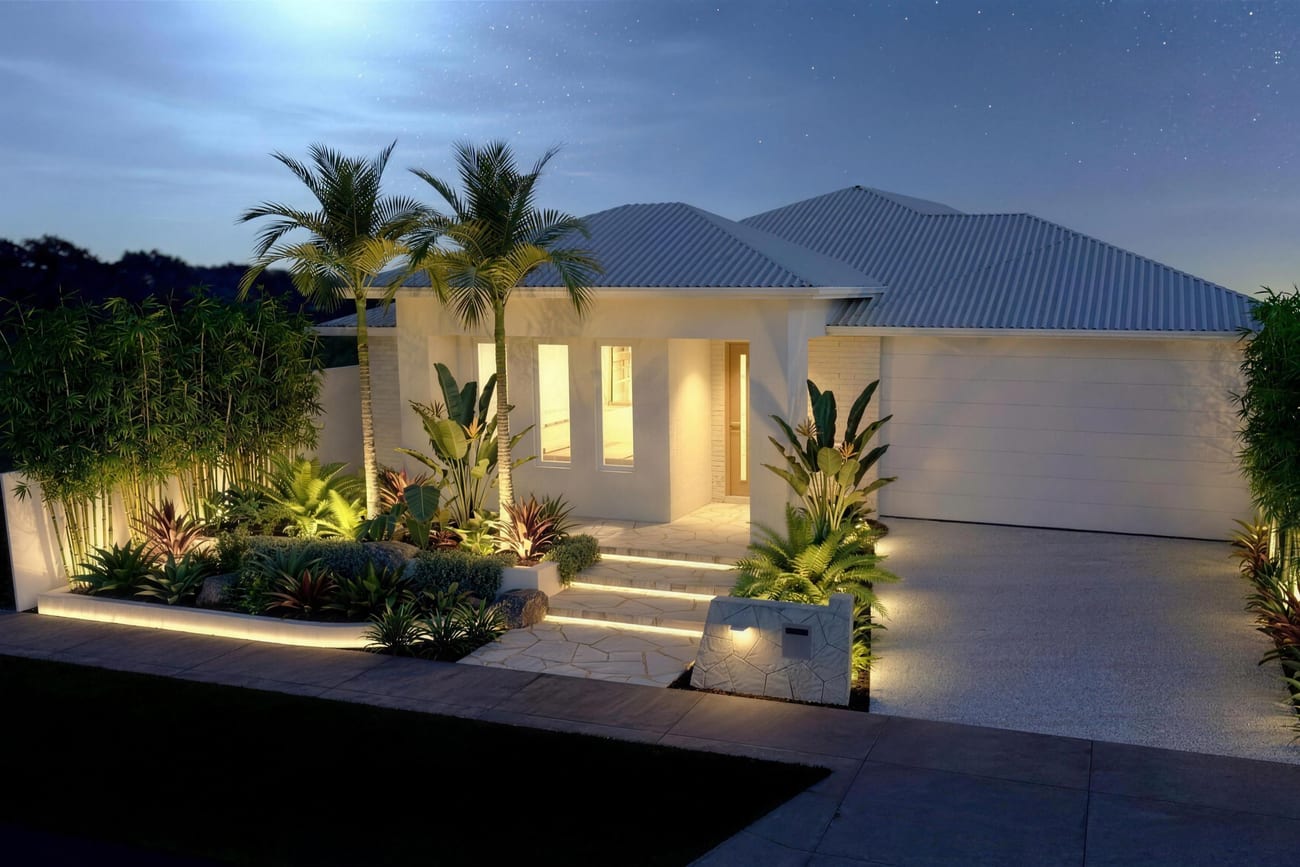 Sunbury project at night, white render walls, layered tropical planting and warm garden lighting