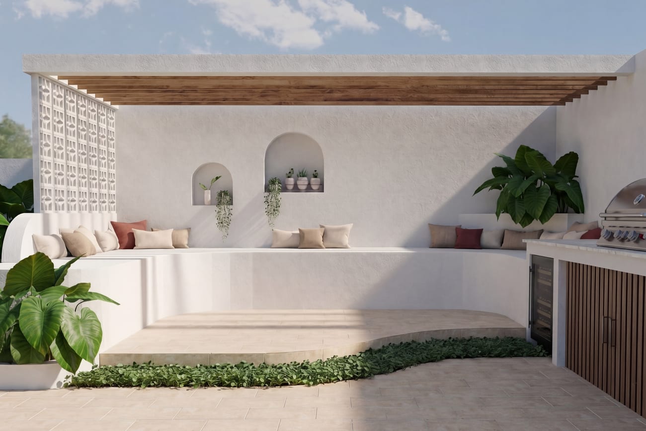 Outdoor kitchen and curved bench seating with a timber pergola and breeze block screen